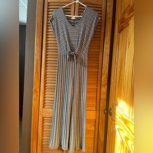 Caution to the wind romper/jumpsuit size medium black /white soft material